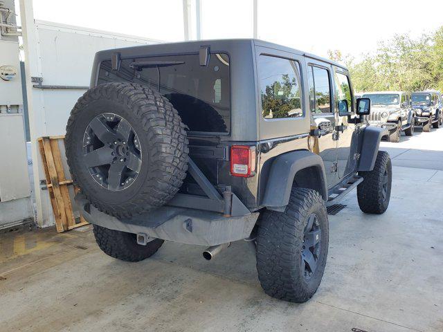 used 2011 Jeep Wrangler Unlimited car, priced at $17,499