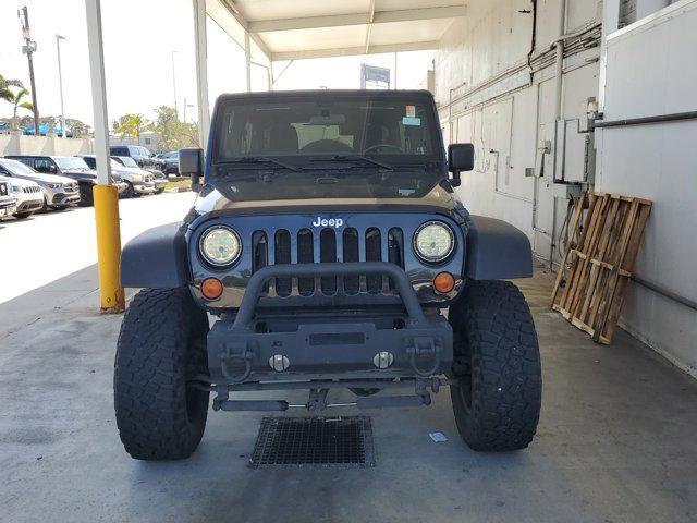 used 2011 Jeep Wrangler Unlimited car, priced at $17,499