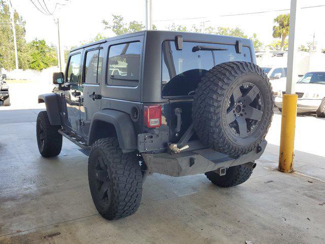 used 2011 Jeep Wrangler Unlimited car, priced at $17,499