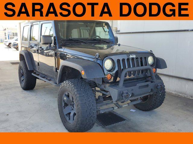 used 2011 Jeep Wrangler Unlimited car, priced at $17,499