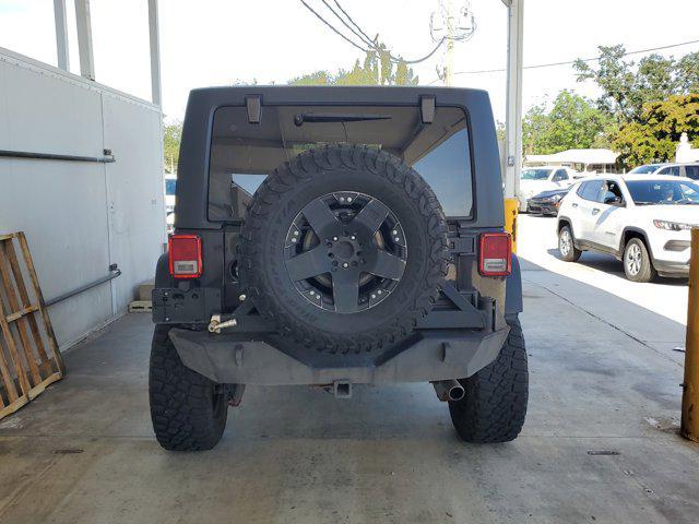 used 2011 Jeep Wrangler Unlimited car, priced at $17,499