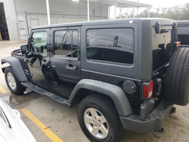 used 2015 Jeep Wrangler Unlimited car, priced at $16,866