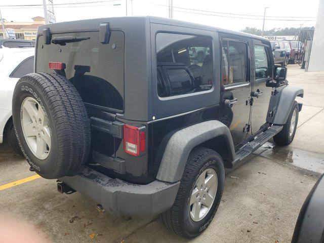 used 2015 Jeep Wrangler Unlimited car, priced at $16,866