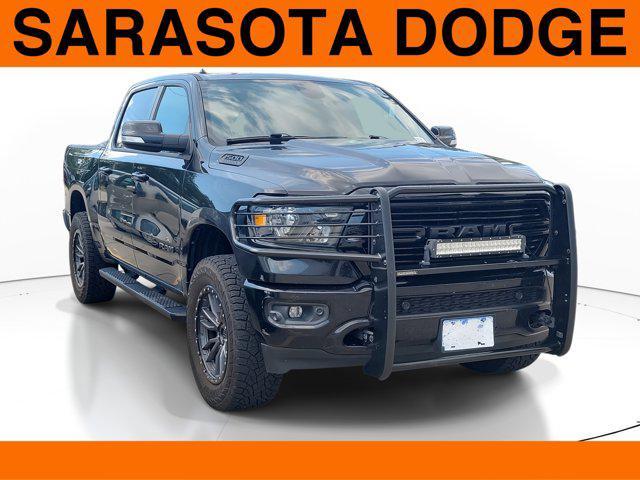 used 2019 Ram 1500 car, priced at $26,174