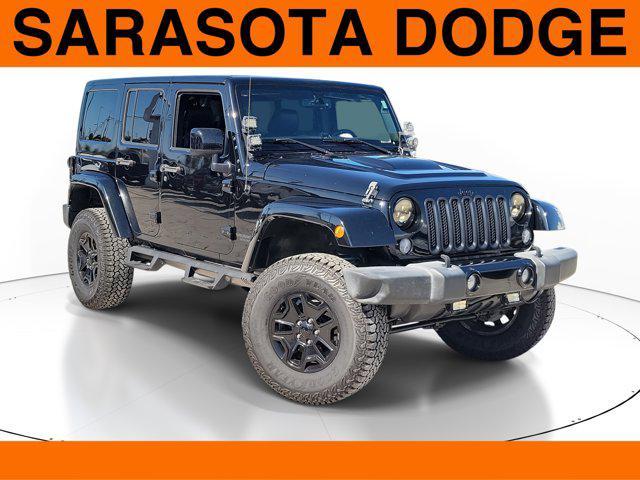 used 2015 Jeep Wrangler Unlimited car, priced at $16,999