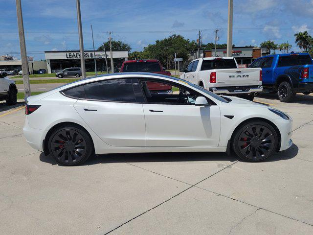 used 2023 Tesla Model 3 car, priced at $30,436