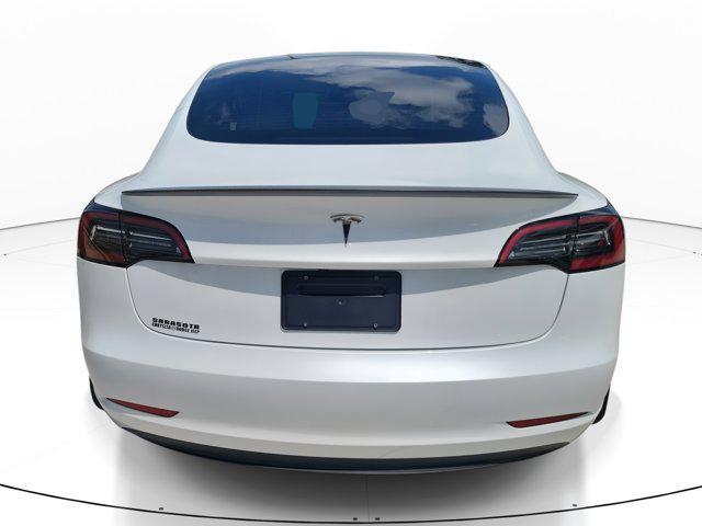 used 2023 Tesla Model 3 car, priced at $30,436