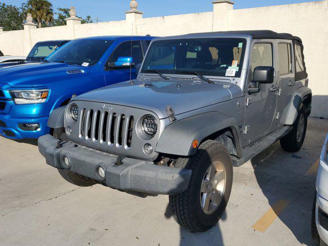 used 2014 Jeep Wrangler Unlimited car, priced at $17,995