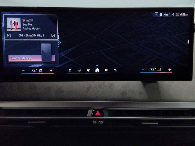 new 2026 BMW iX car, priced at $99,925