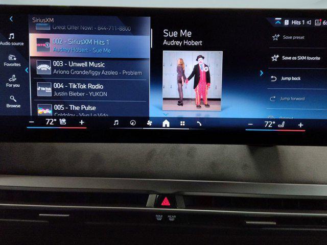 new 2026 BMW iX car, priced at $99,925