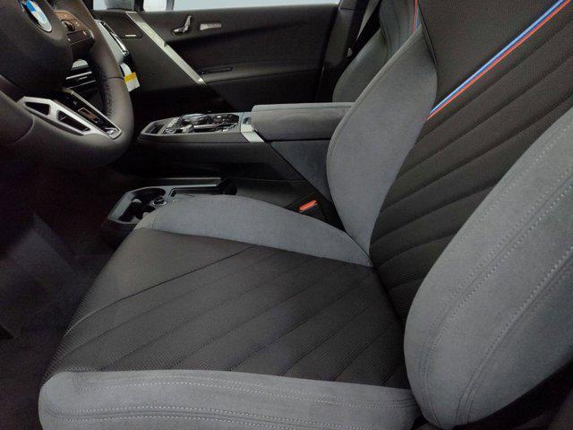 new 2026 BMW iX car, priced at $99,925