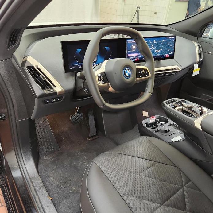 new 2024 BMW iX car, priced at $97,595