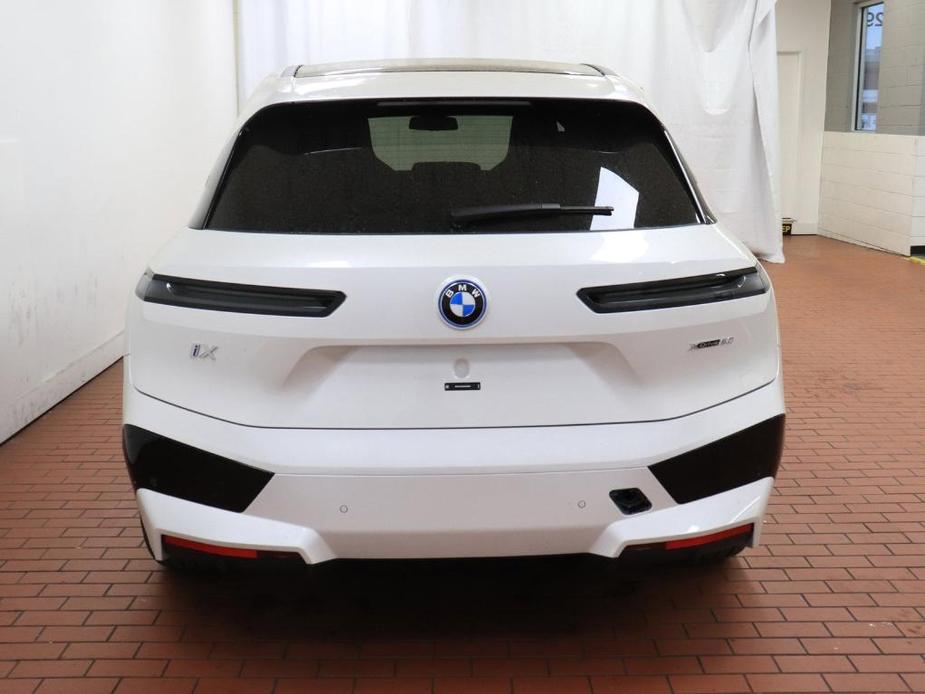 new 2024 BMW iX car, priced at $98,095