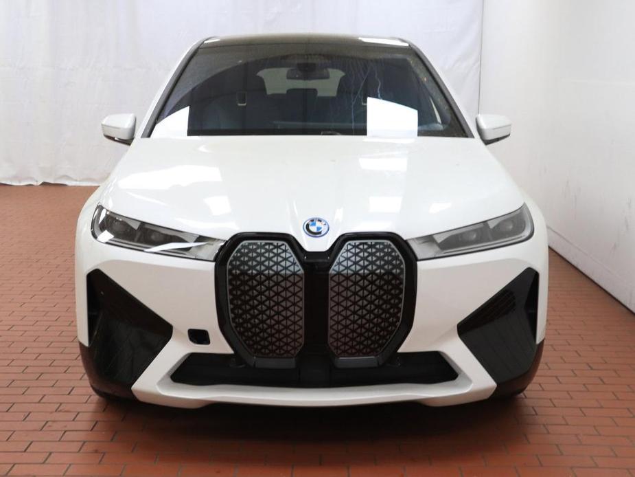 new 2024 BMW iX car, priced at $98,095