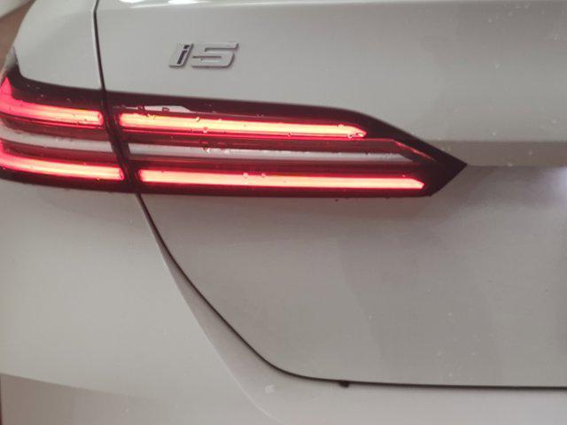 new 2025 BMW i5 car, priced at $74,670