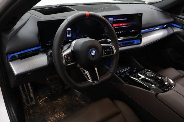 used 2024 BMW i5 car, priced at $63,498