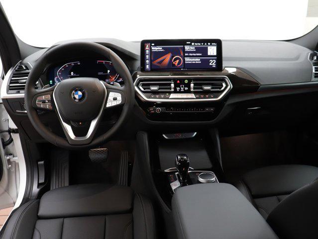 used 2024 BMW X4 car, priced at $54,322