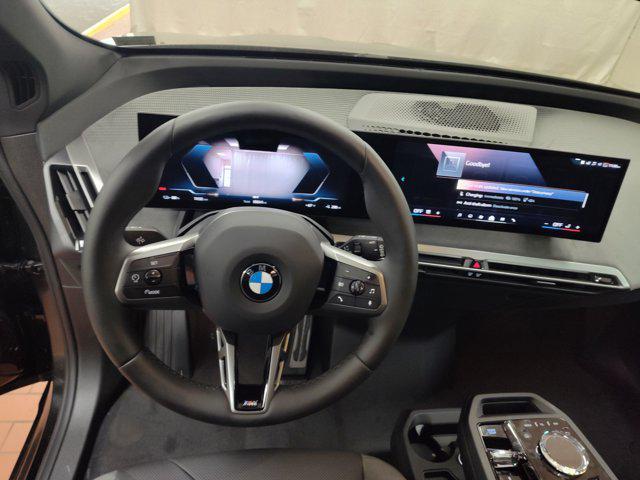 new 2026 BMW iX car, priced at $88,075
