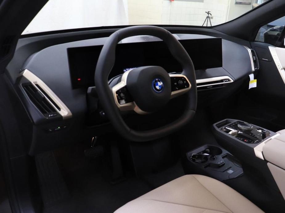 new 2024 BMW iX car, priced at $97,095