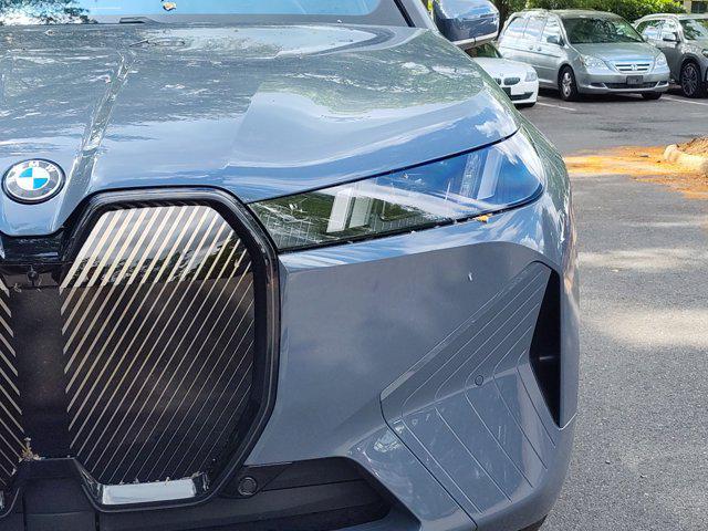 new 2026 BMW iX car, priced at $83,275