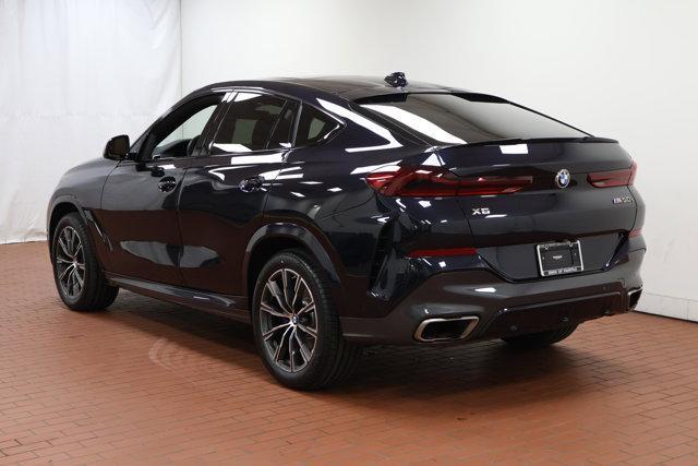 used 2022 BMW X6 car, priced at $57,296