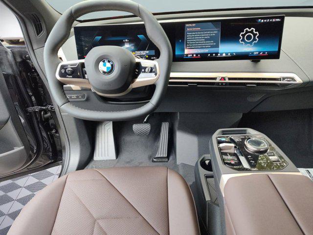 new 2026 BMW iX car, priced at $82,175