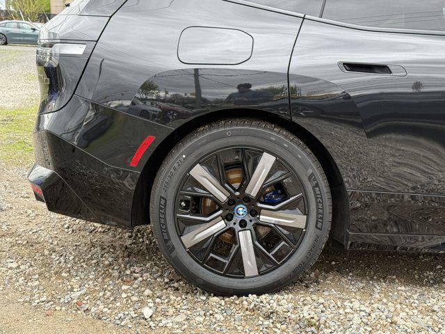 new 2025 BMW iX car, priced at $116,095