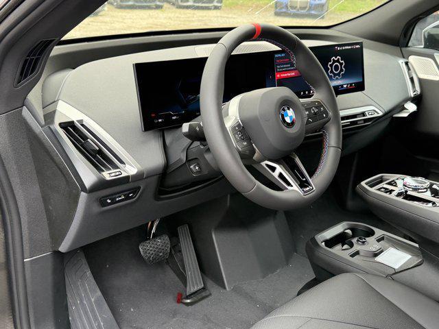 new 2025 BMW iX car, priced at $116,095