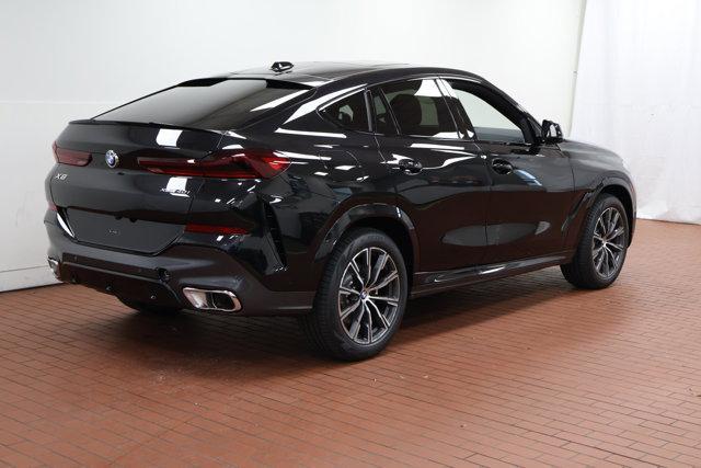 new 2025 BMW X6 car, priced at $77,875