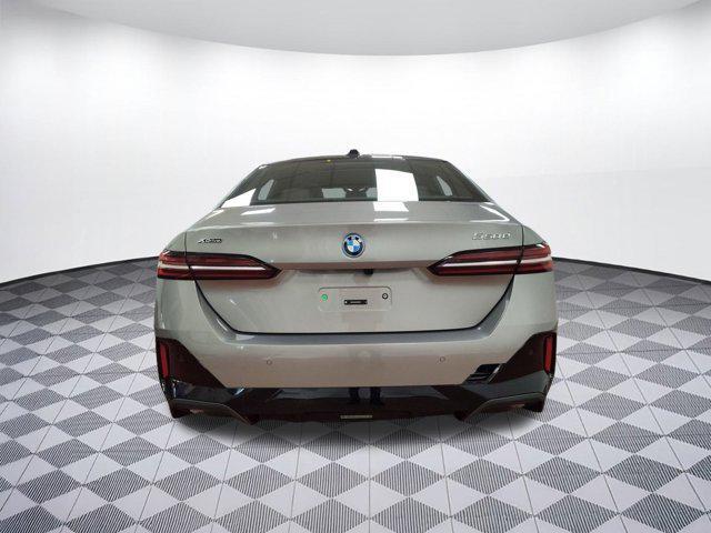 new 2026 BMW 550e car, priced at $86,025