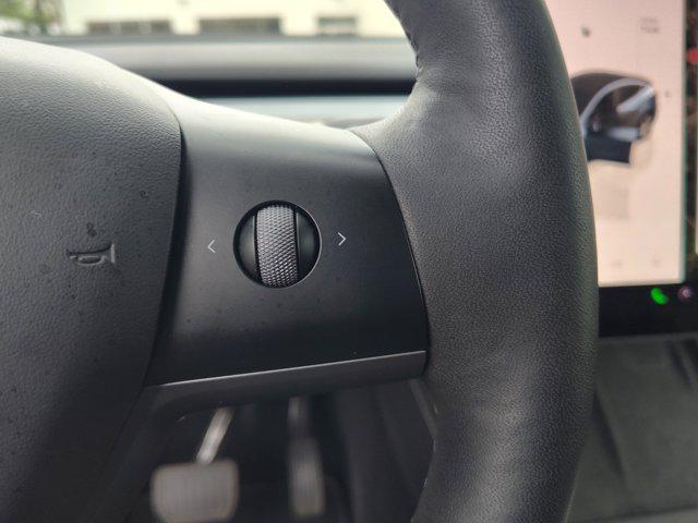 used 2024 Tesla Model Y car, priced at $32,999