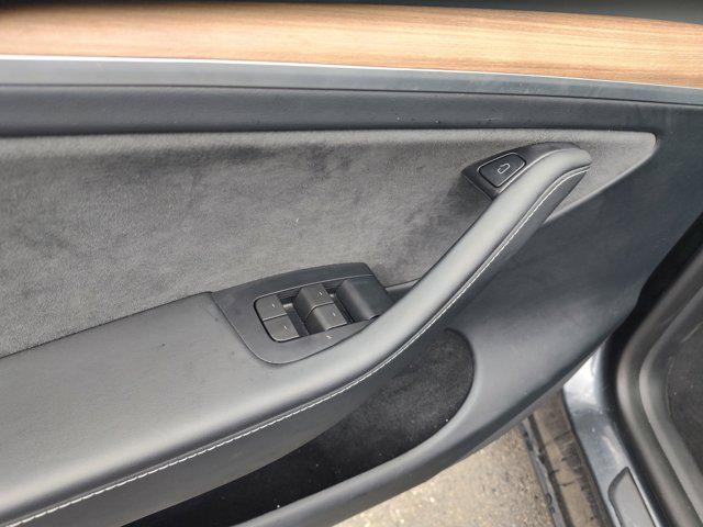 used 2024 Tesla Model Y car, priced at $32,999