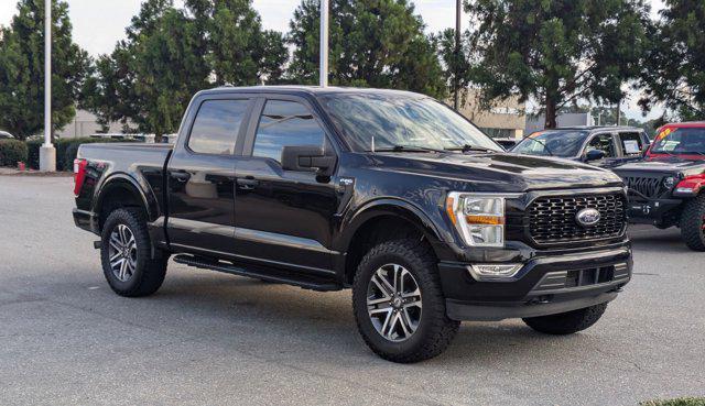 used 2021 Ford F-150 car, priced at $33,900