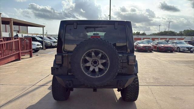 used 2015 Jeep Wrangler Unlimited car, priced at $17,995