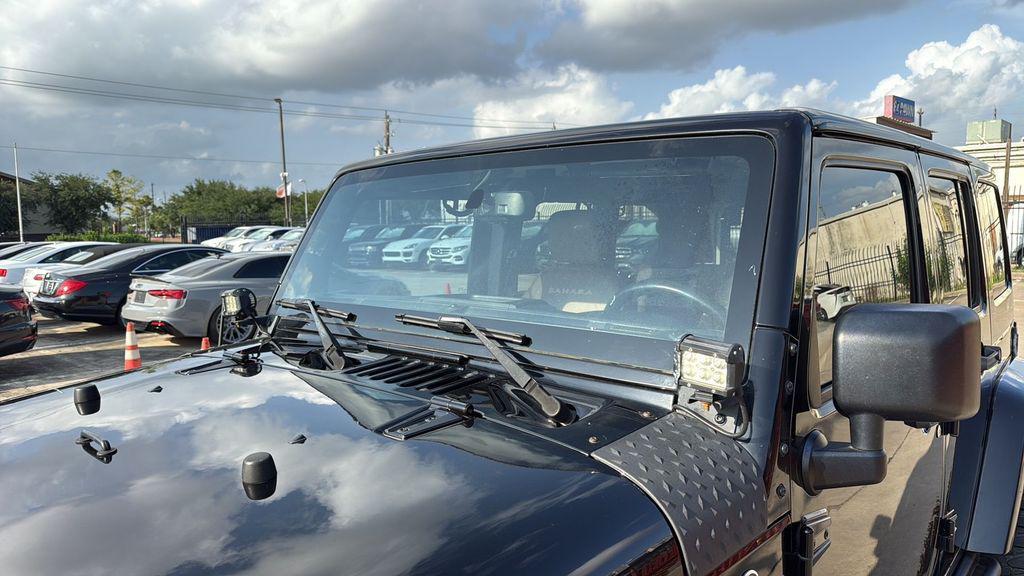 used 2015 Jeep Wrangler Unlimited car, priced at $16,995