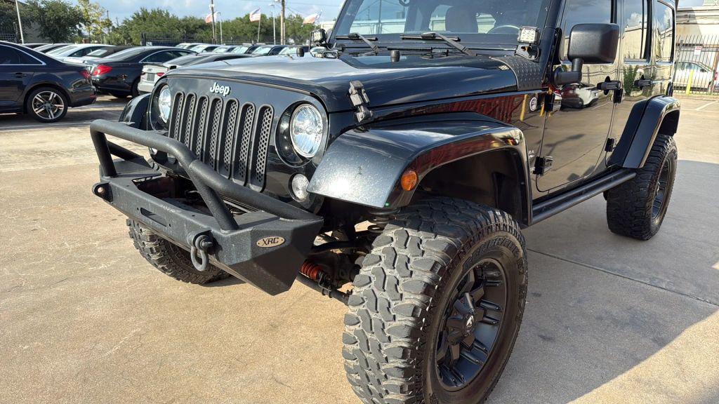 used 2015 Jeep Wrangler Unlimited car, priced at $16,995