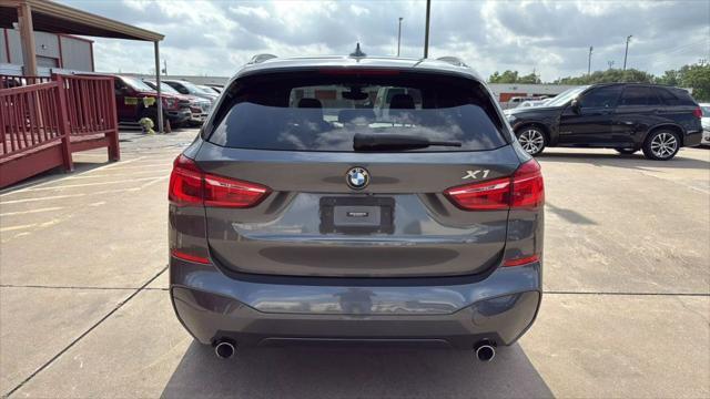 used 2018 BMW X1 car, priced at $14,995
