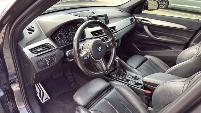 used 2018 BMW X1 car, priced at $14,995