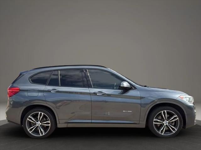 used 2018 BMW X1 car, priced at $13,995