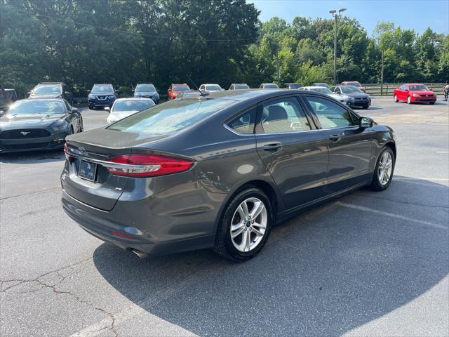 used 2018 Ford Fusion car, priced at $13,975