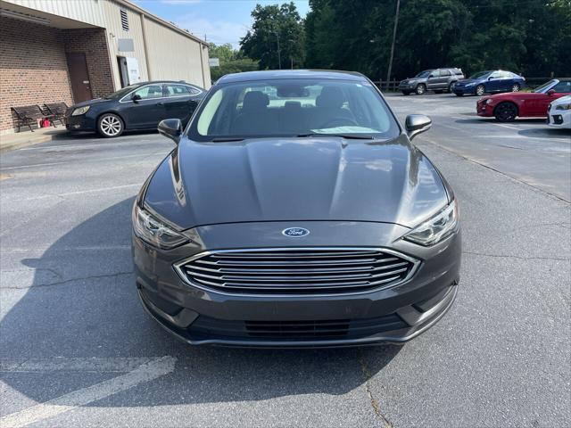 used 2018 Ford Fusion car, priced at $13,975