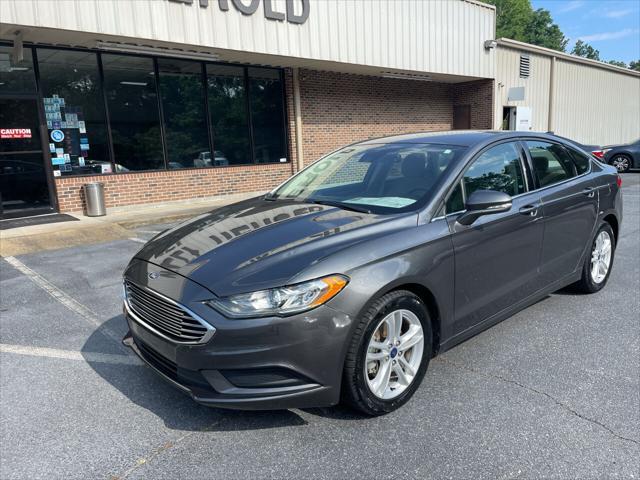 used 2018 Ford Fusion car, priced at $13,975