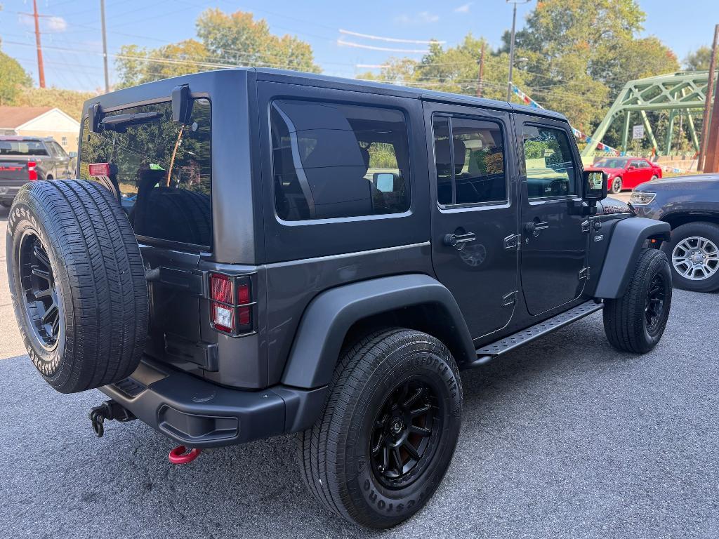 used 2017 Jeep Wrangler Unlimited car, priced at $31,900