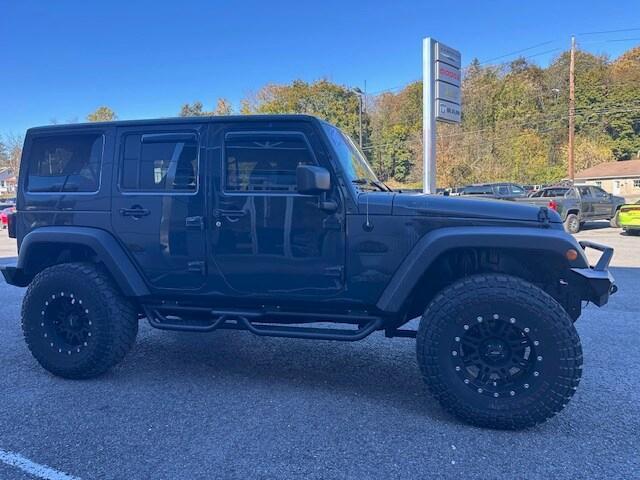 used 2017 Jeep Wrangler Unlimited car, priced at $23,990