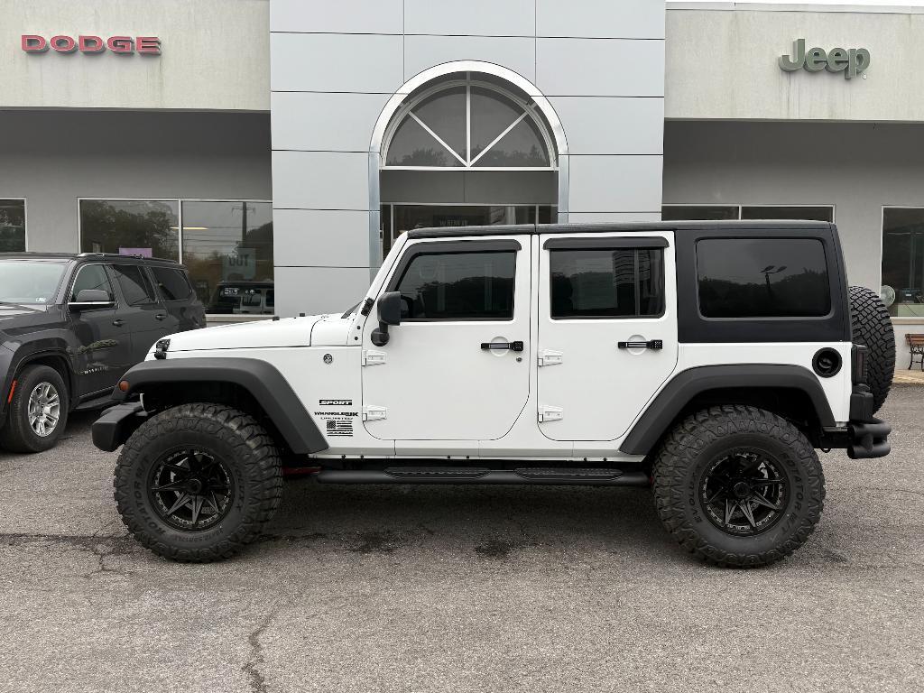 used 2018 Jeep Wrangler JK Unlimited car, priced at $26,900