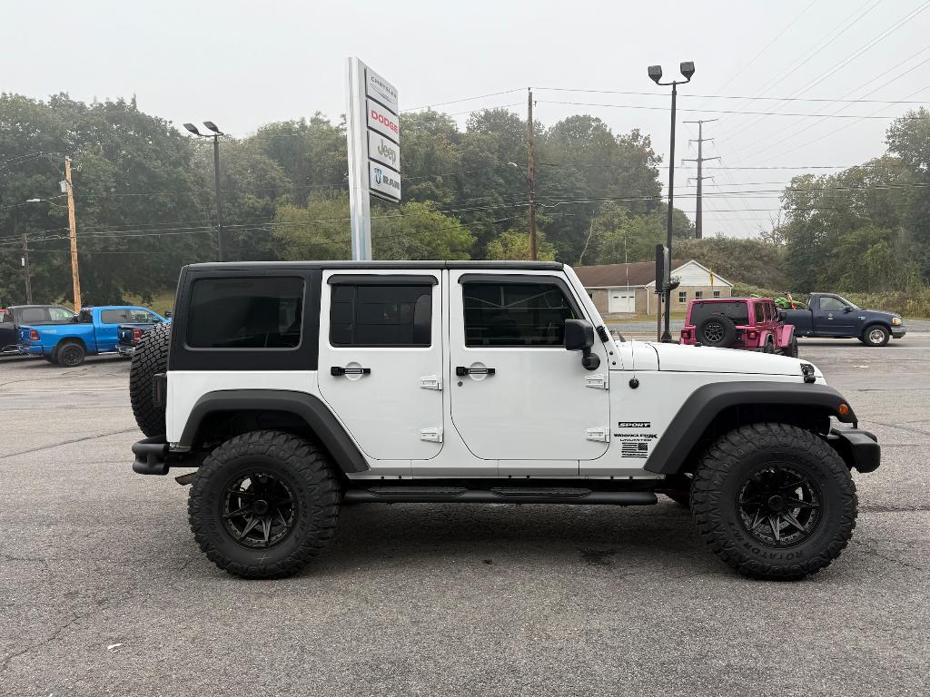 used 2018 Jeep Wrangler JK Unlimited car, priced at $26,900