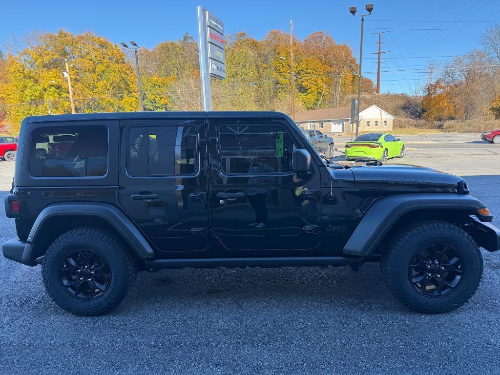 used 2023 Jeep Wrangler car, priced at $33,900