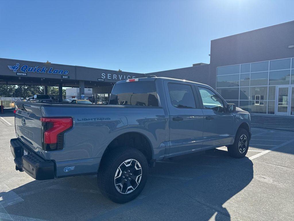 used 2023 Ford F-150 Lightning car, priced at $35,950
