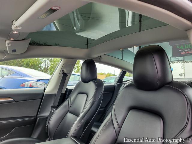 used 2023 Tesla Model 3 car, priced at $22,500