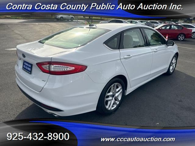 used 2015 Ford Fusion car, priced at $8,580